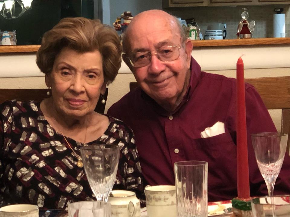 Chris Schlak's grandparents, Tomás and Nereida Rodriguez, on Christmas Eve 2021 at a family dinner in Houston.