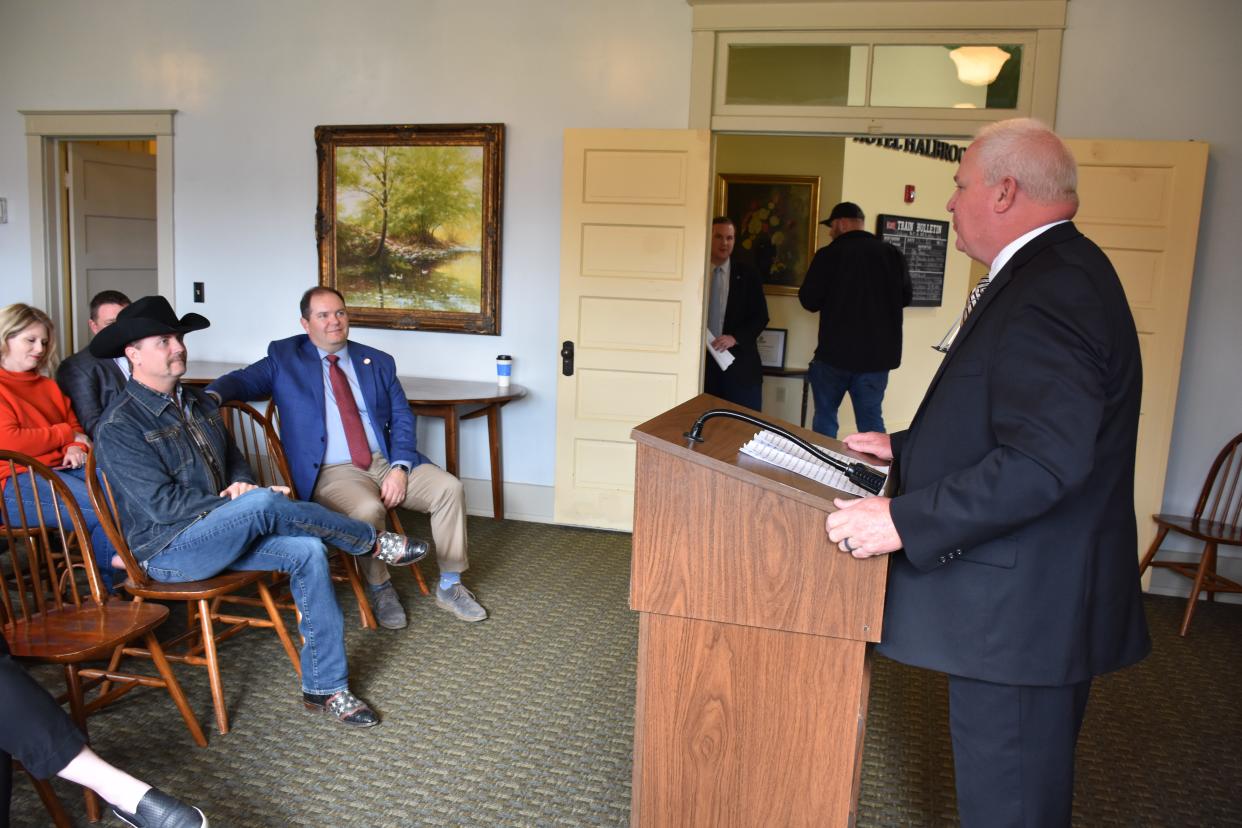 City of Dickson Mayor Don Weiss Jr. speaks at the unveiling of the “Tennessee Music Pathways” marker for Dickson County High School graduate John Rich on Tuesday, March 7 at the Clement Railroad Hotel Museum in Dickson.