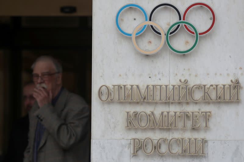 People gather outside the headquarters of the Olympic Committee of Russia in Moscow