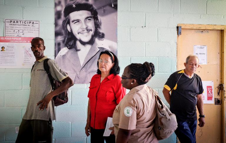 Cubans queue to vote at a polling station in Havana's Nautico neighbourhood on April 19, 2015 during municipal elections