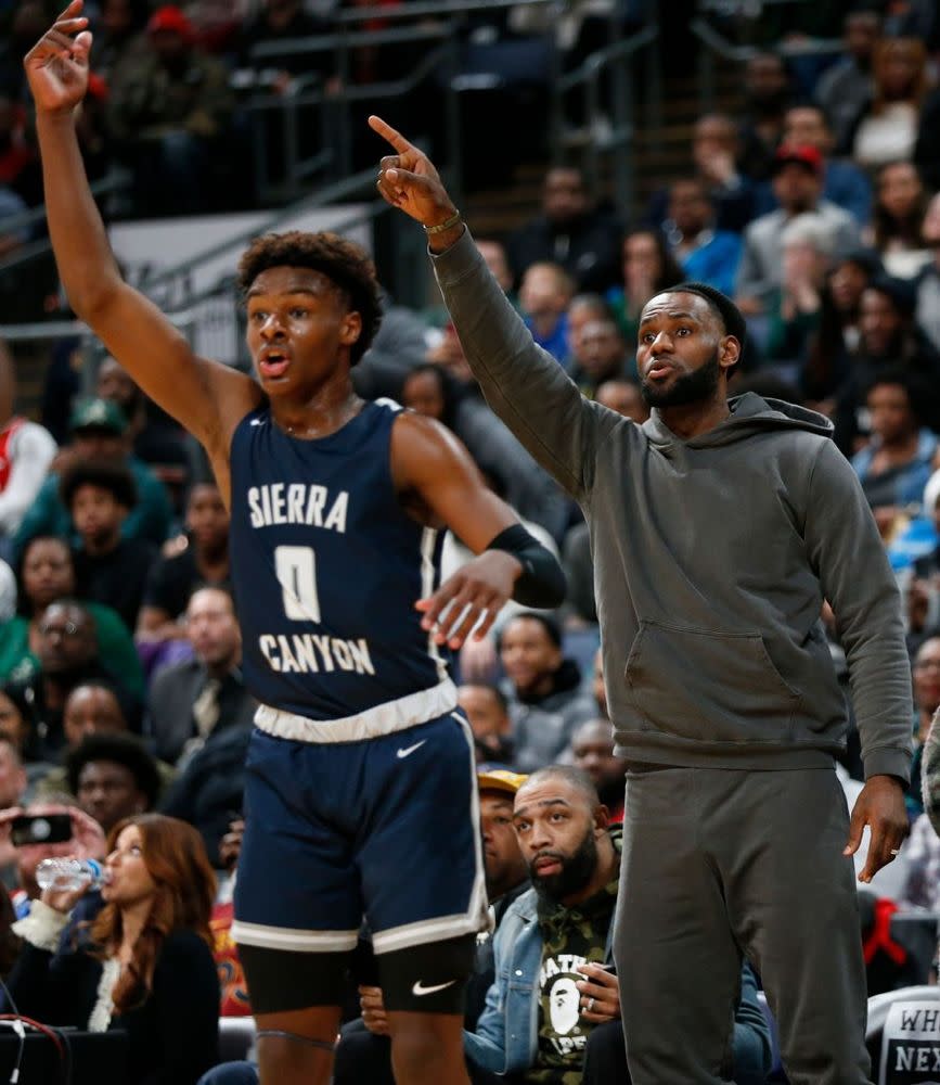 LeBron James with son Bronny | Jay LaPrete/AP