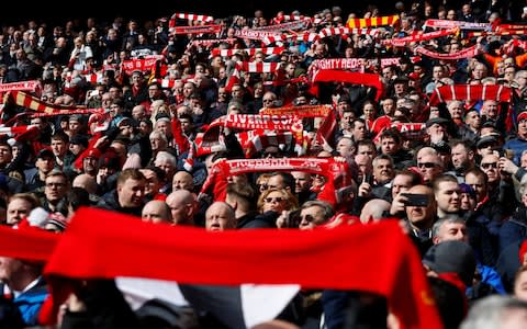 Soccer Football - Premier League - Liverpool v Burnley - Anfield, Liverpool, Britain - March 10, 2019 Liverpool fans before the match Action Images via Reuters/Jason Cairnduff EDITORIAL USE ONLY. No use with unauthorized audio, video, data, fixture lists, club/league logos or "live" services. Online in-match use limited to 75 images, no video emulation. No use in betting, games or single club/league/player publications. Please contact your account representative for further details - Credit: Action Images