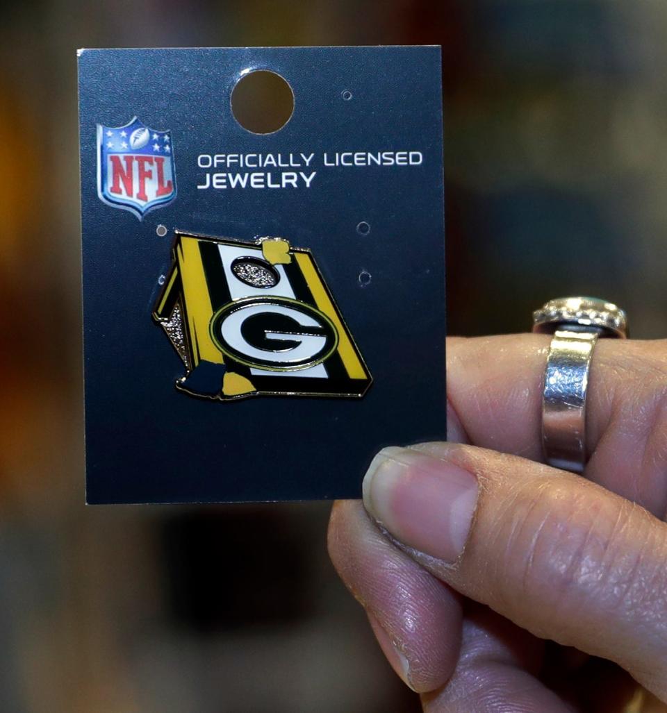 A Green Bay Packers bean bag toss pin for sale at the Packers Pro Shop on Jan. 17, 2023, in Green Bay, Wis.