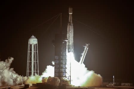 A SpaceX Falcon Heavy rocket, carrying the U.S. Air Force's Space Test Program 2 Mission, lifts off from the Kennedy Space Center in Cape Canaveral, Florida