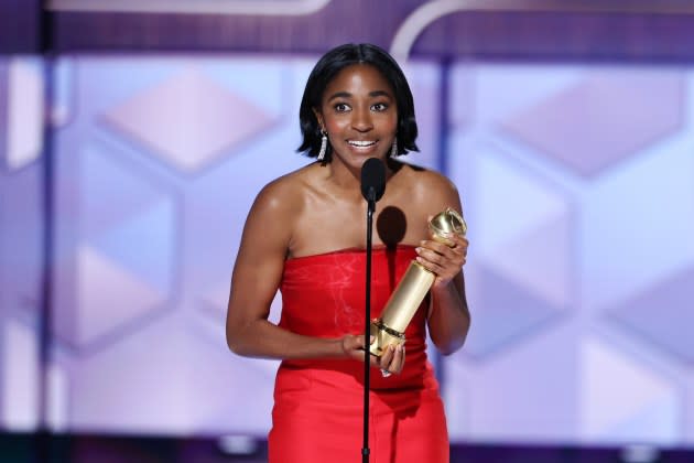 Ayo Edebiri accepts her award for 'The Bear' at the 2024 Golden Globes. - Credit: Rich Polk/Golden Globes 2024 via Getty Images