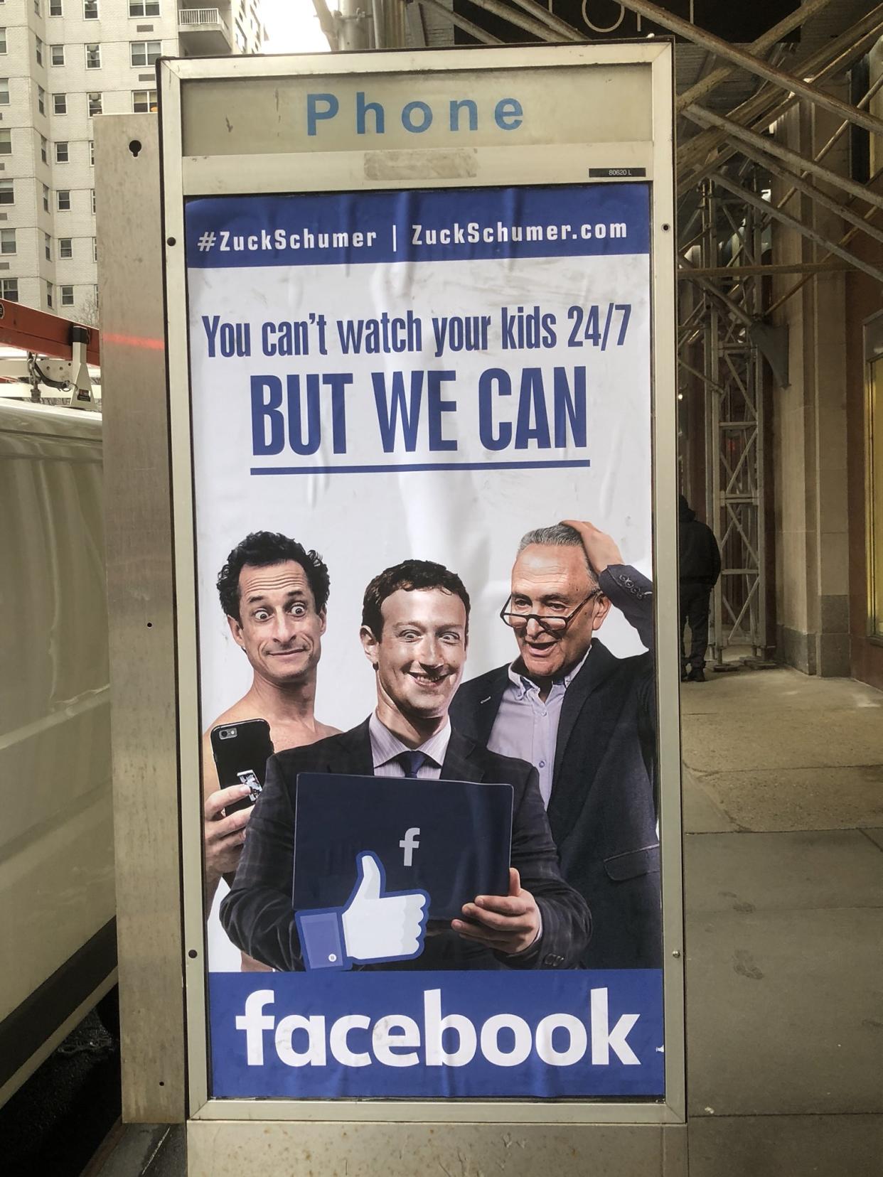 A poster hanging on a phone booth outside of Facebook’s New York office in Astor Place, Manhattan.