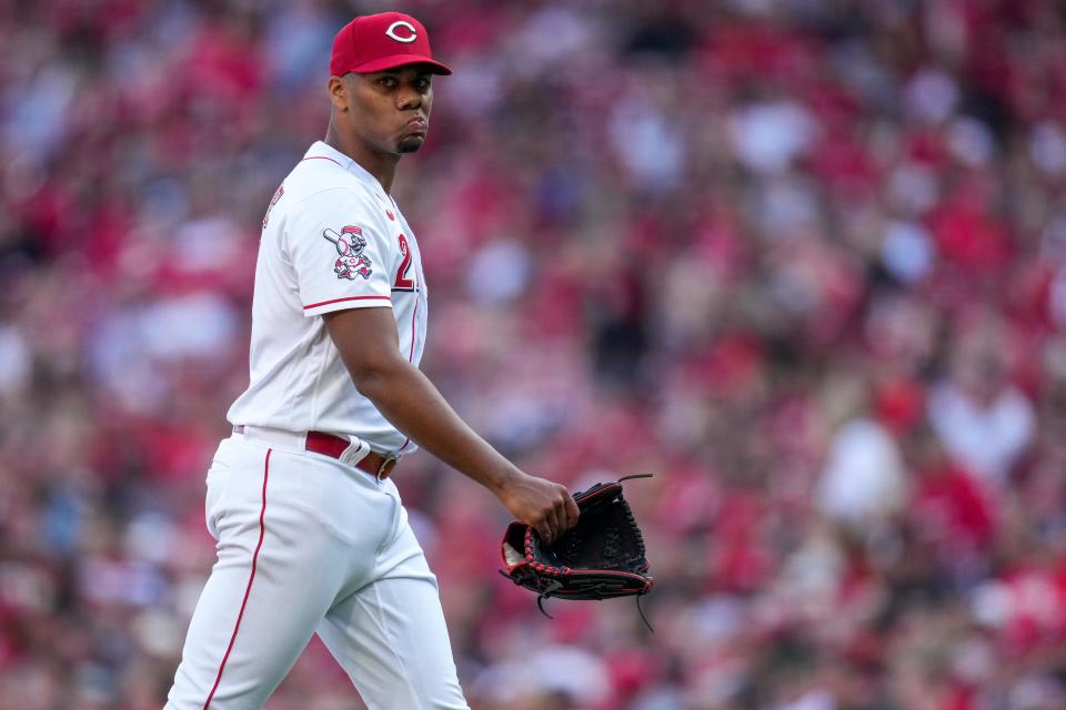 Cincinnati Reds starting pitcher Hunter Greene (21) returns tot he dugout after being relieved in the fourth inning of the MLB Opening Day game between the Cincinnati Reds and the Pittsburgh Pirates at Great American Ball Park in downtown Cincinnati on Thursday, March 30, 2023. The Pirates led 4-2 in the fifth inning.