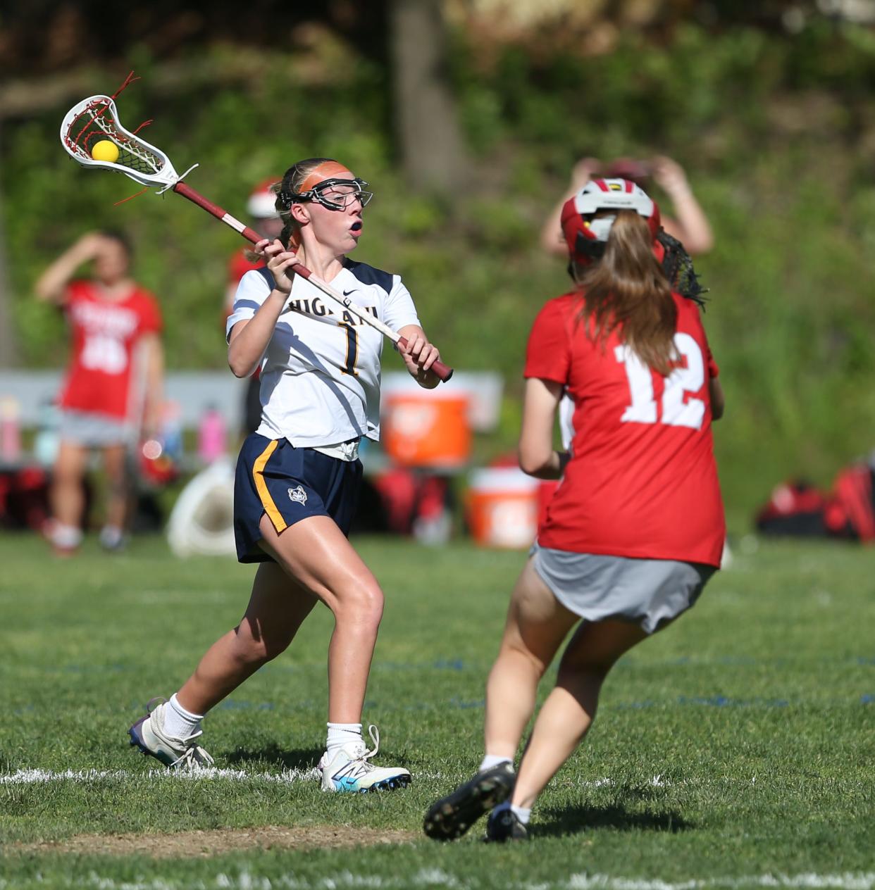 Highland's Quinn Ahrenholz shoots to score during a game versus Red Hook on May 8, 2024.