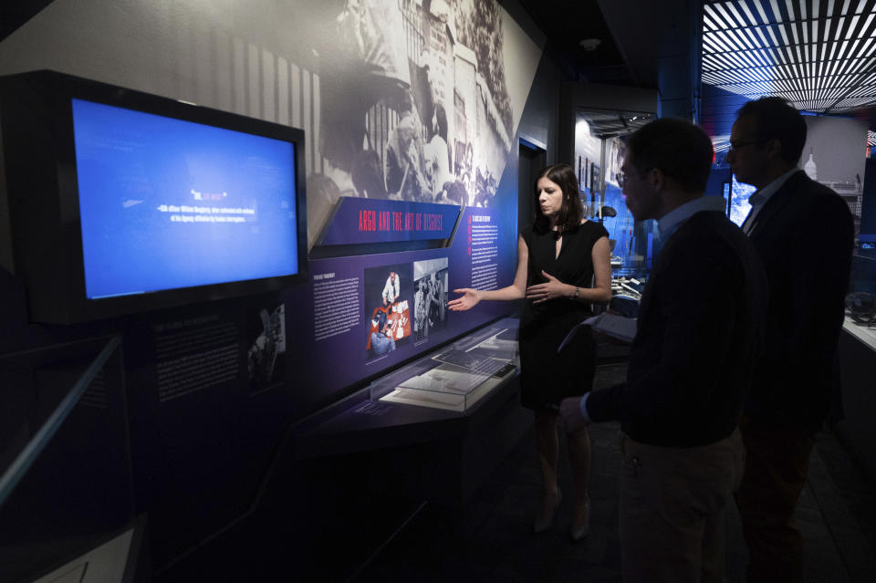 Deputy Director for the Museum in the Central Intelligence Agency Janelle Neises talks about the "Argo" exhibit in the refurbished museum in the CIA headquarters building in Langley, Va., on Saturday, Sept. 24, 2022. (AP Photo/Kevin Wolf)