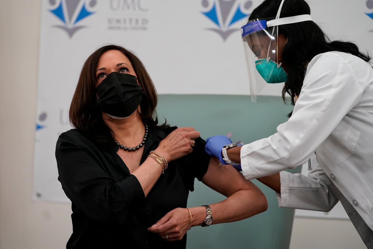 Vice President-Elect Kamala Harris receives the Moderna COVID-19 vaccine from nurse Patricia Cummings on Tuesday, Dec. 29, 2020, at United Medical Center in southeast Washington, DC.