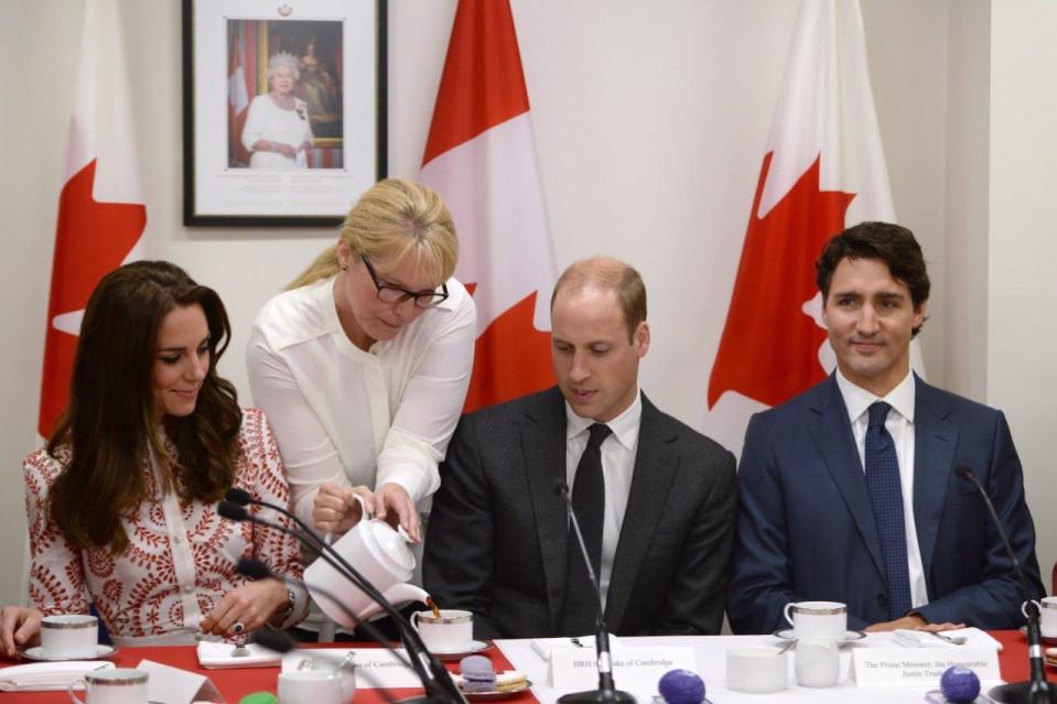 The Duke and Duchess of Cambridge have a cup of tea alongside Prime Minister Justin Trudeau during a roundtable discussion at the Kitsilano Coast Guard station, in Vancouver on Sunday, Sept. 25, 2016. THE CANADIAN PRESS/Jonathan Hayward