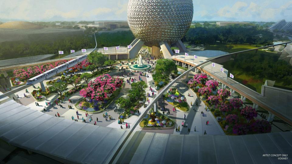In this artist rendering, a new entrance plaza in development at Epcot will greet guests with new pathways, sweeping green spaces and a reimagined fountain. This design will pay homage to the original park entrance with fresh takes on classic elements.