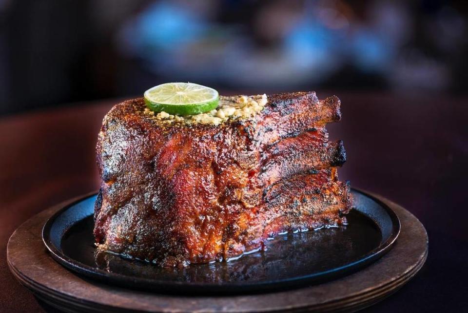 The signature “7-finger” pork chop at Perry’s Steakhouse & Grille.