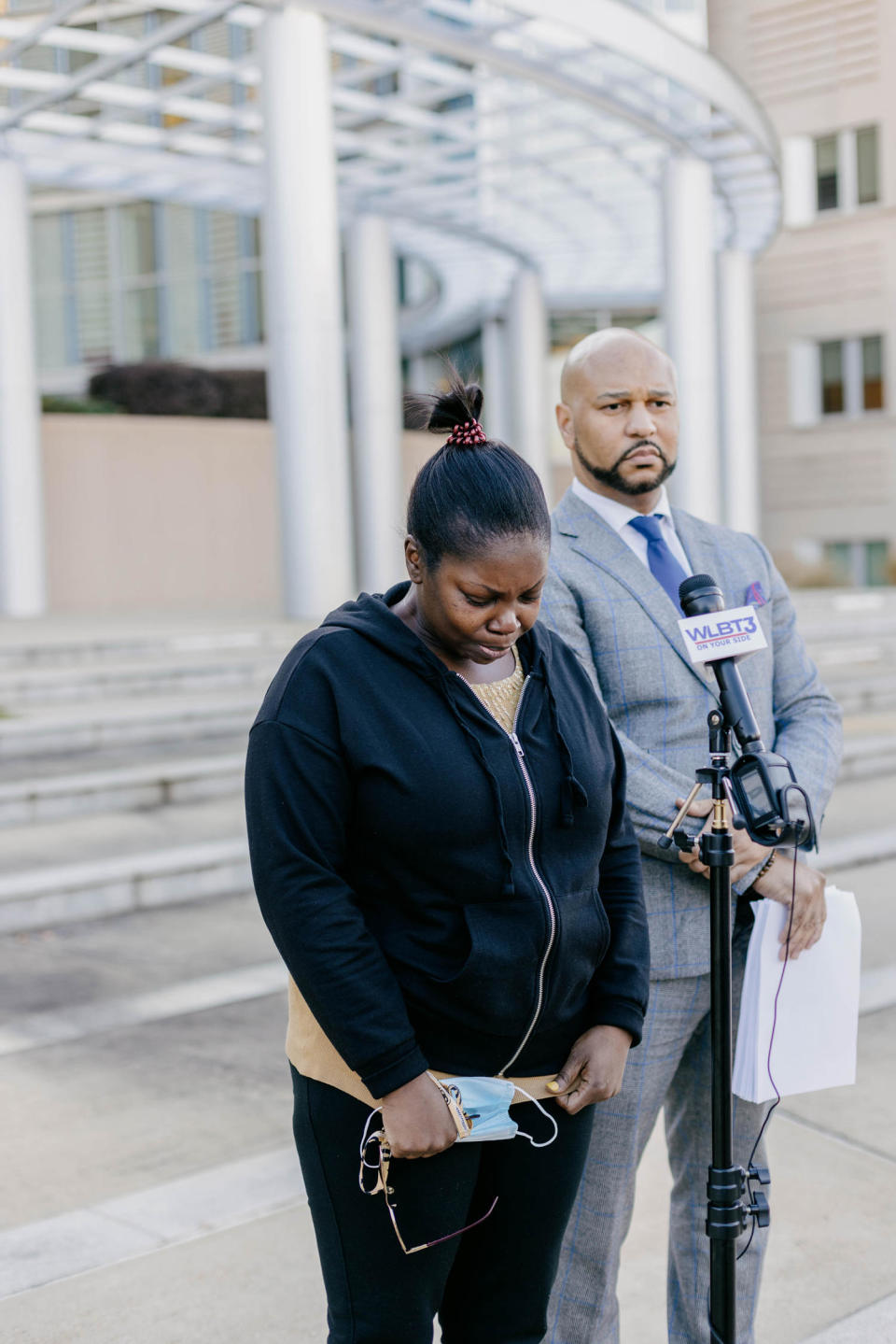 Sherita Harris and Attorney Carlos Moore at a news conference Federal Court building in Jackson, Miss. (Imani Khayyam for NBC News)