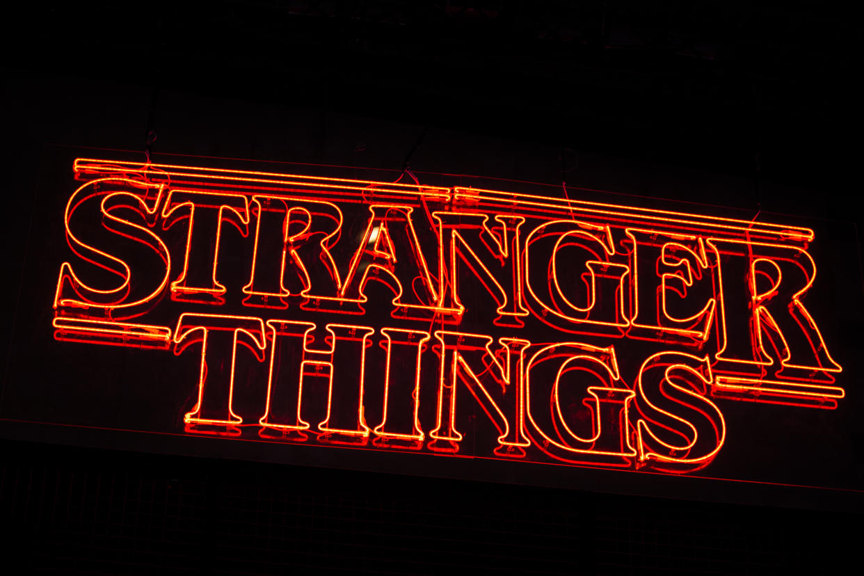 The logo of the Netlfix series “Stranger Things” is seen at the Paris Games Week in Paris. (AP Photo/Kamil Zihnioglu)