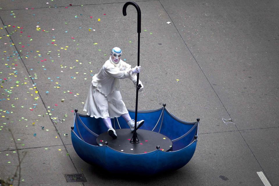 A participant makes his way down 6th Ave during the Macy's Thanksgiving Day Parade, in New York