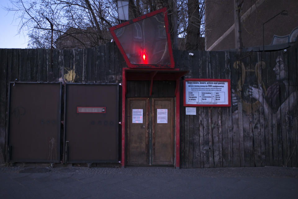 This March 25, 2020, photo, shows an entrance to the closed music club Wilde Renate in Berlin, Germany. The nightclubs in the German capital have decided to keep the beat going — at least online. Berlin's nightclubs were closed on March 13 in an attempt to slow the spread of the coronavirus. In response, some clubs formed a streaming platform to let DJs, musicians and artists continue to perform. (AP Photo/Markus Schreiber)