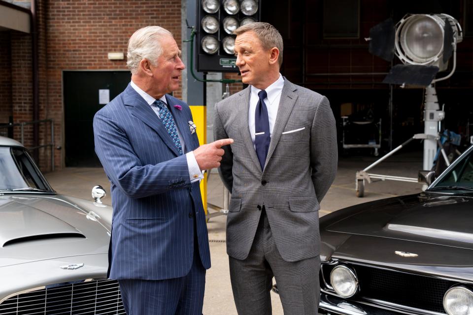 Prince Charles meets British actor Daniel Craig as he tours the set of the 25th James Bond Film at Pinewood Studios on June 20, 2019 in England.