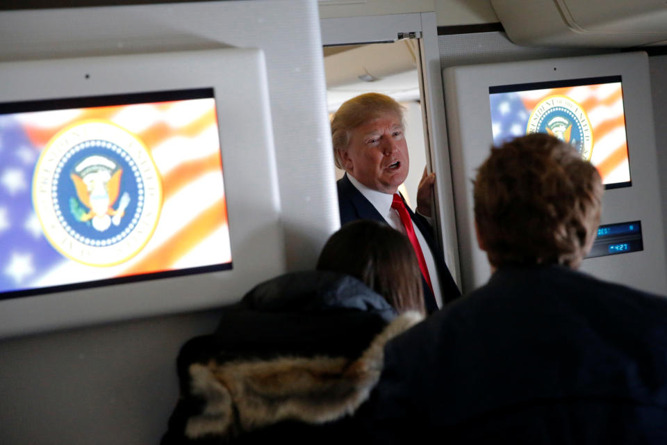 <p>President Donald Trump greets reporters in the press cabin aboard Air Force One, on his way to an extended trip to five countries in Asia, after departing Joint Base Andrews, Md., Nov. 3, 2017. (Photo: Jonathan Ernst/Reuters) </p>