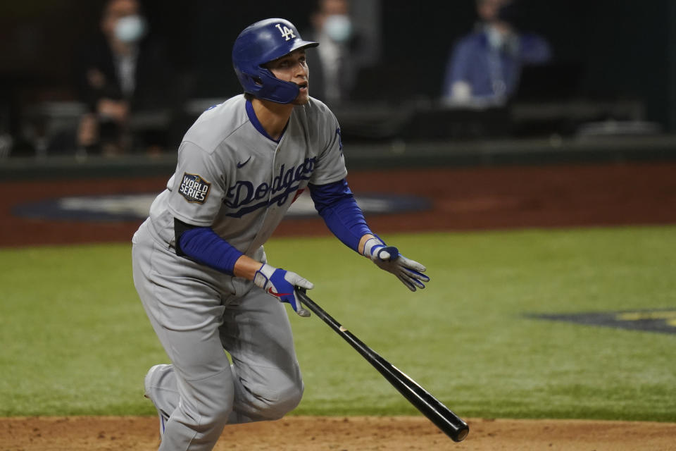 Los Angeles Dodgers' Corey Seager hits a home run against the Tampa Bay Rays during the third inning in Game 4 of the baseball World Series Saturday, Oct. 24, 2020, in Arlington, Texas. (AP Photo/Eric Gay)
