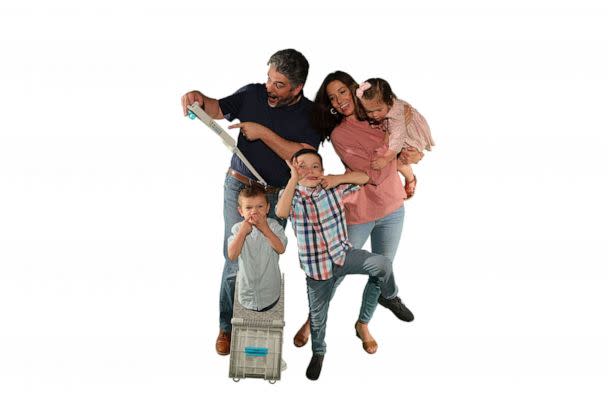 PHOTO: Nichole and Jack Clark pose with their sons Jonah, Noah and Avery. (Buggie Huggie)