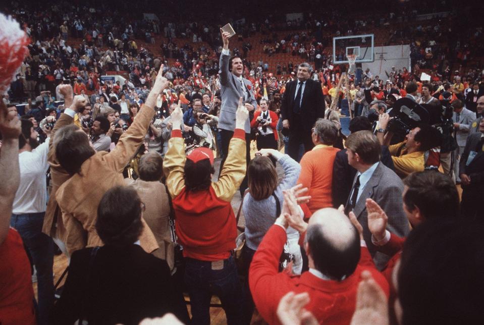 U of L's Denny Crum celebrates the 1980 NCAA championship on Feb. 11, 2000.