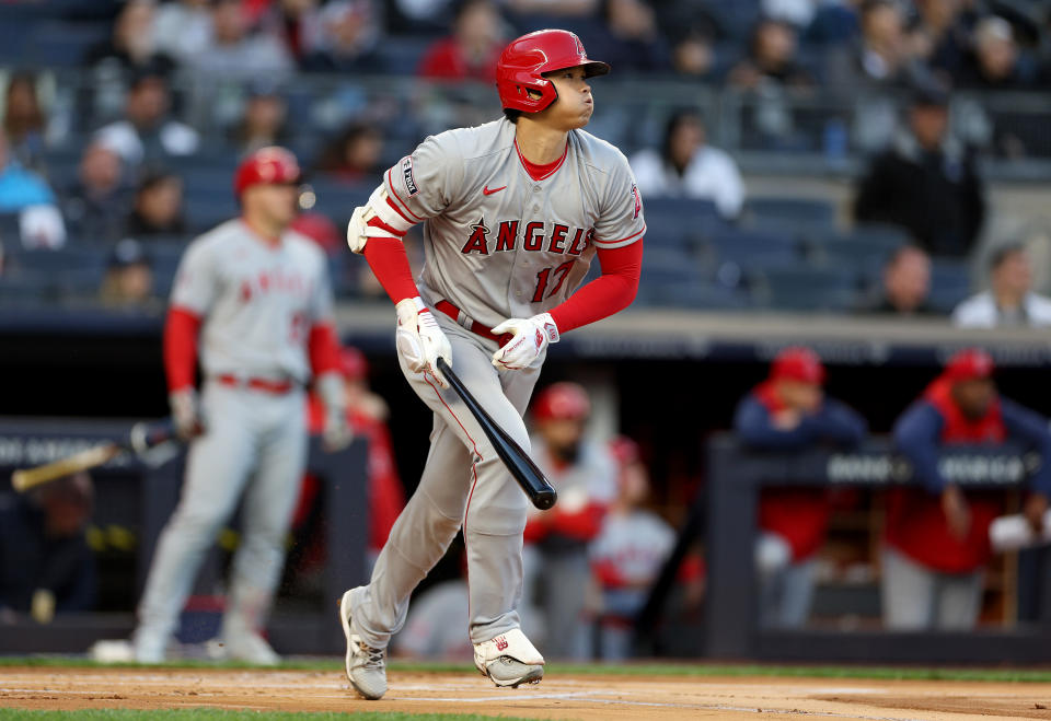 BRONX, NEW YORK - APRIL 18:  Shohei Ohtani #17 of the Los Angeles Angels hits a two run home run in the first inning against the New York Yankees at Yankee Stadium on April 18, 2023 in the Bronx borough of New York City. (Photo by Elsa/Getty Images)