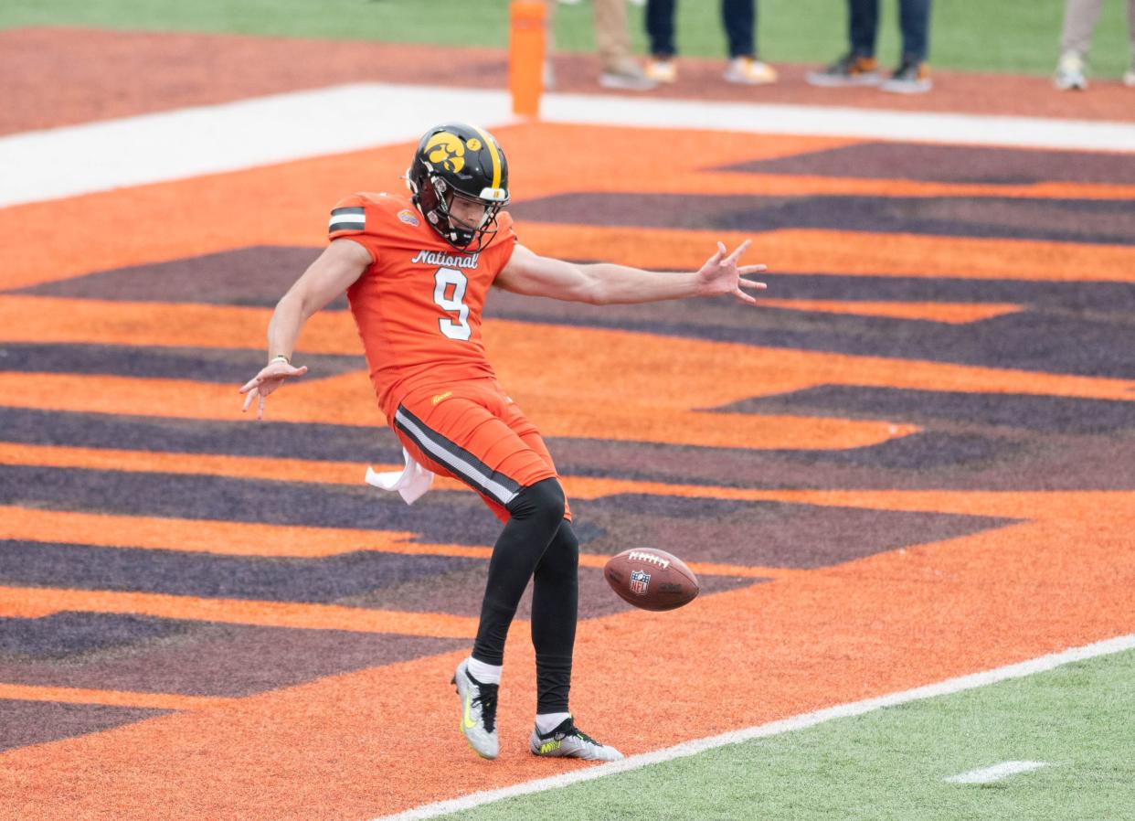 Former Iowa P Tory Taylor (9) punts during the Reese's Senior Bowl in Mobile, Alabama on Saturday, Feb. 3, 2024.