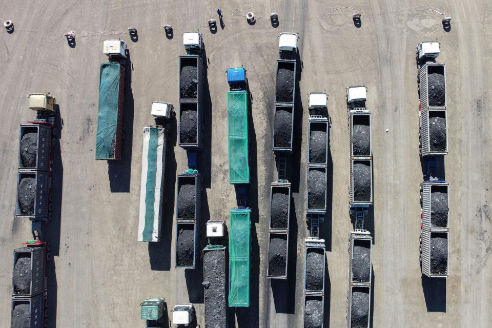 Trucks loaded with coal waiting near Gants Mod port at the Chinese border with Gashuun Sukhait, in Umnugovi province, in Mongolia on Oct. 16, 2021.<span class="copyright">Uugansukh Byamba—AFP/Getty Images</span>