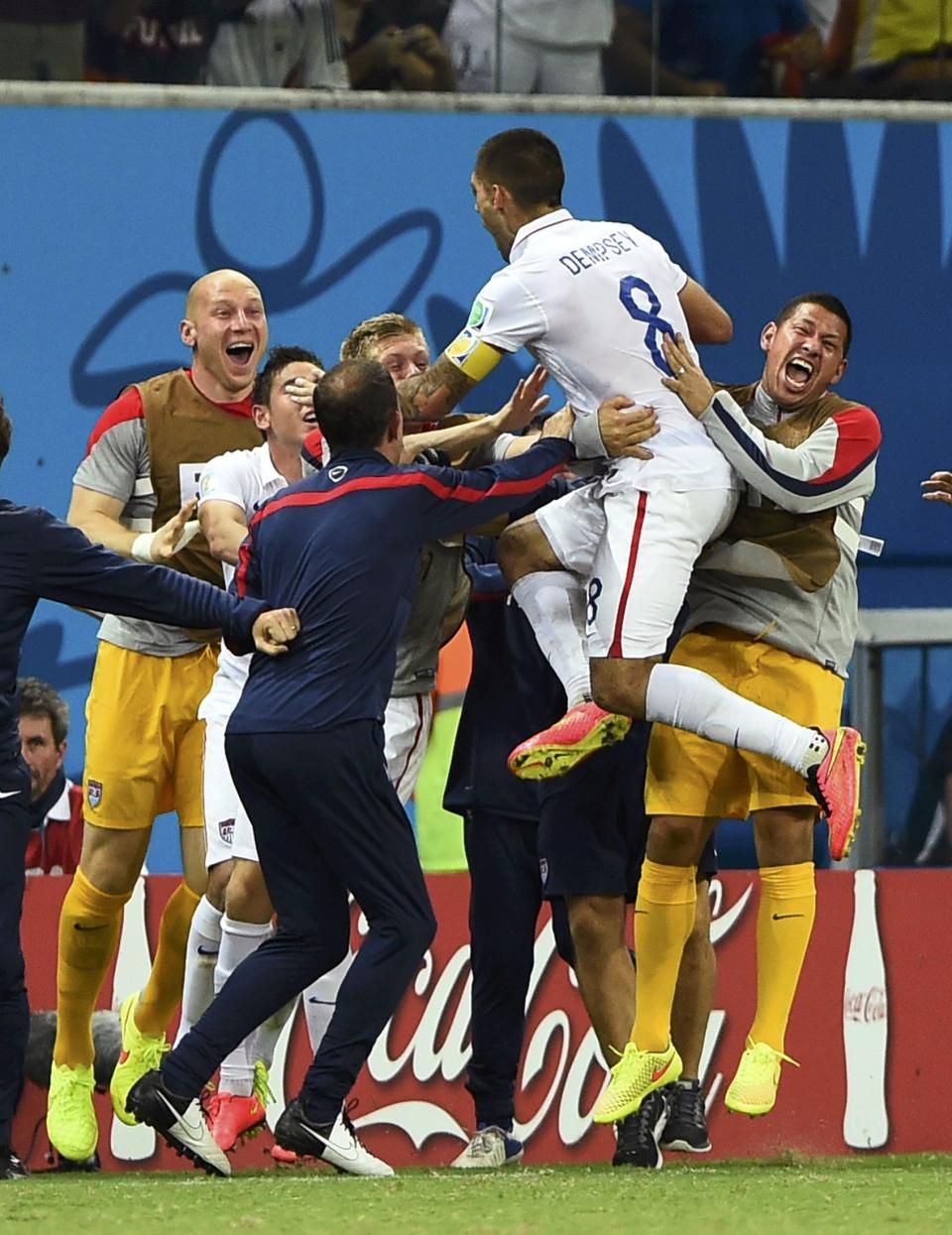 Dempsey of the U.S. celebrates after scoring a goal with teammates during their 2014 World Cup G soccer match against Portugal at the Amazonia arena in Manaus