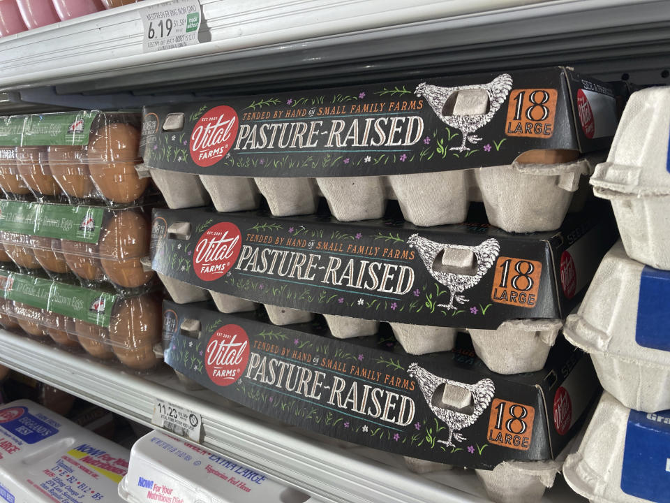 Cartons of eggs are shown in a grocery store, Tuesday, April 11, 2023, in Surfside, Fla. (AP Photo/Wilfredo Lee)