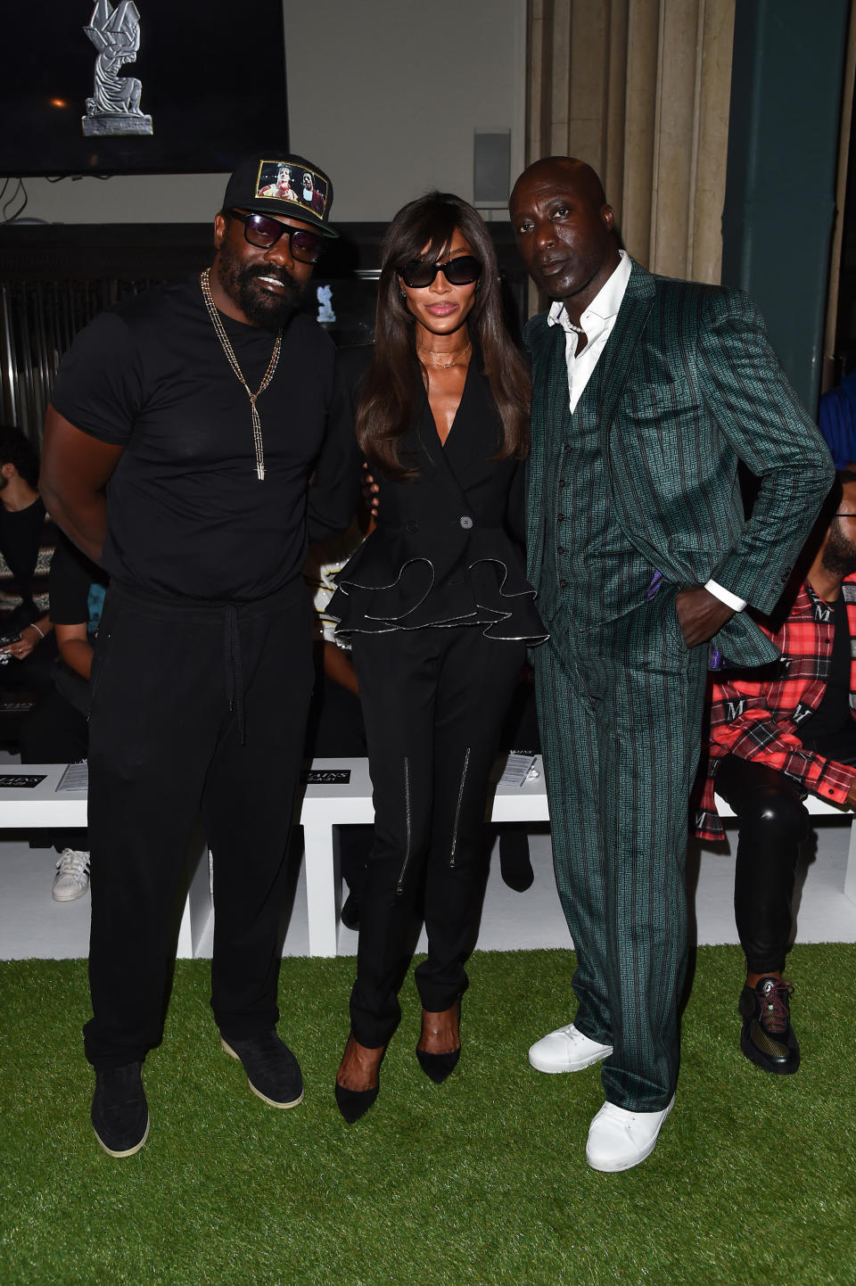 Dereck Chisora, Naomi Campbell and Ozwald Boateng attend the Mains show by Skepta