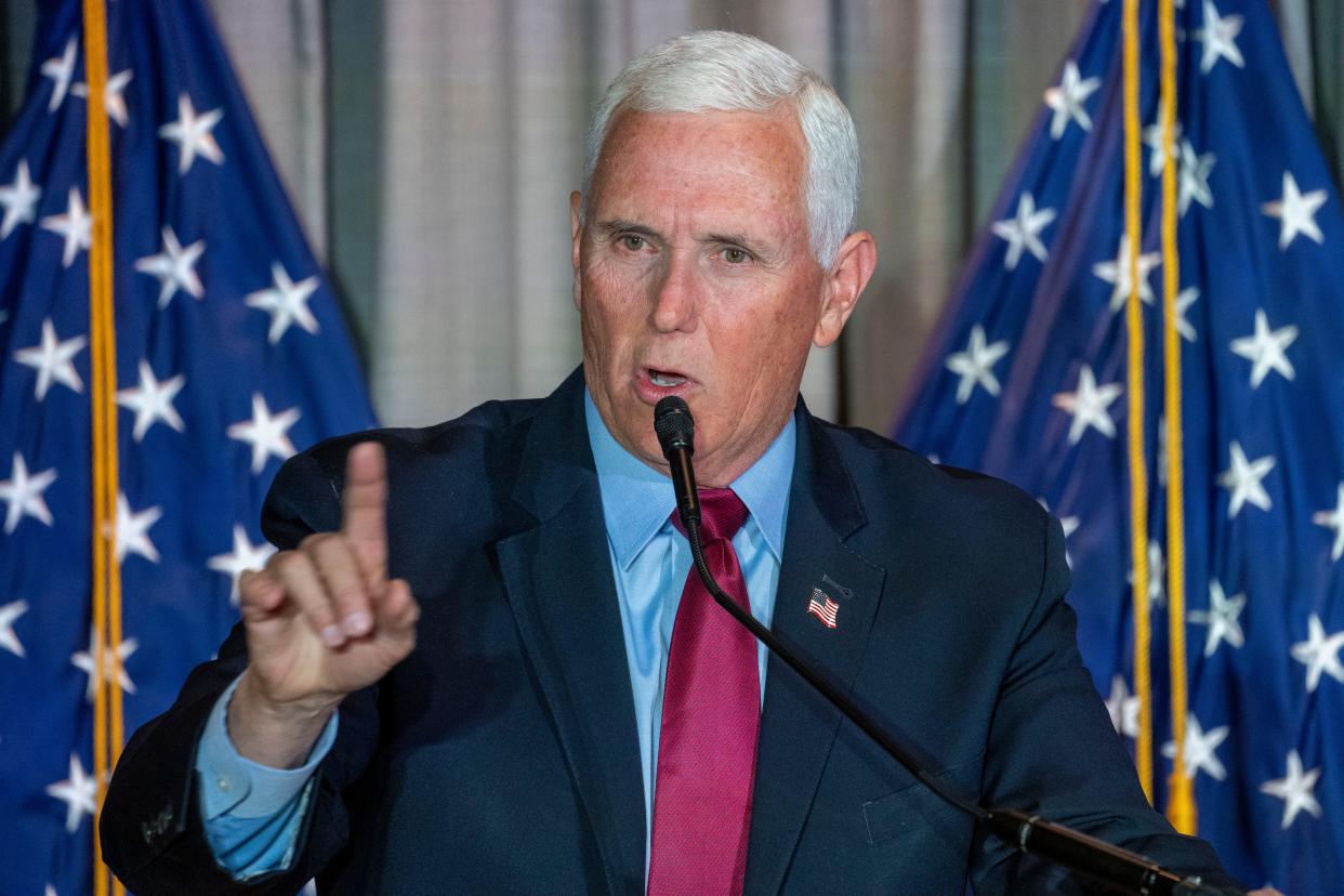 Former Vice President Mike Pence pauses while speaking at a Coolidge and the American Project luncheon in the Madison Building of the Library of Congress, Thursday, Feb. 16, 2023, in Washington.