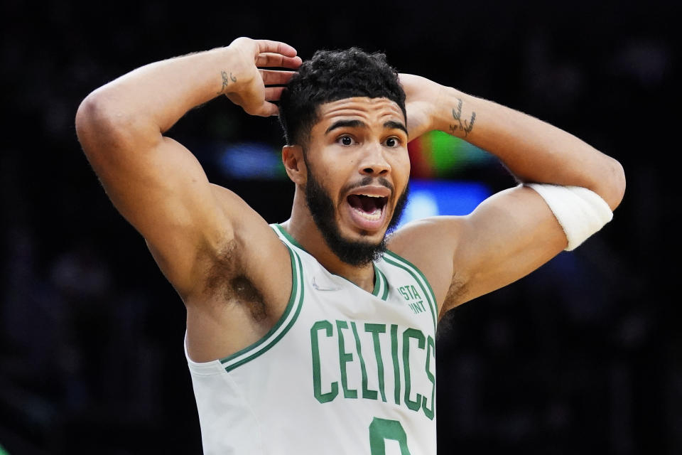 Boston Celtics forward Jayson Tatum (0) argues a call during the first half of an NBA basketball game against the Washington Wizards, Wednesday, Oct. 27, 2021, in Boston. (AP Photo/Charles Krupa)