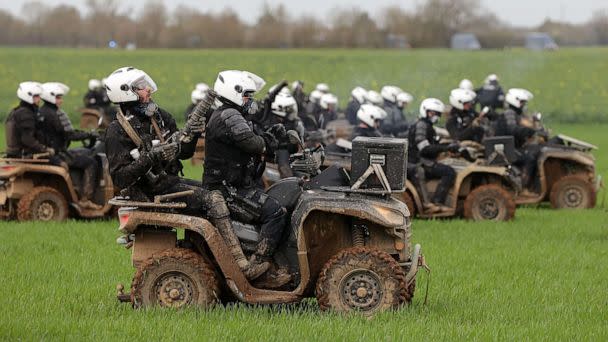 PHOTO: Gendarmes fire teargas shells towards protesters during a demonstration called by the collective 'Bassines non merci', to protest against the construction of a new water reserve for agricultural irrigation, in Sainte-Soline, France, Mar. 25, 2023. (Thibaud Moritz/AFP via Getty Images)