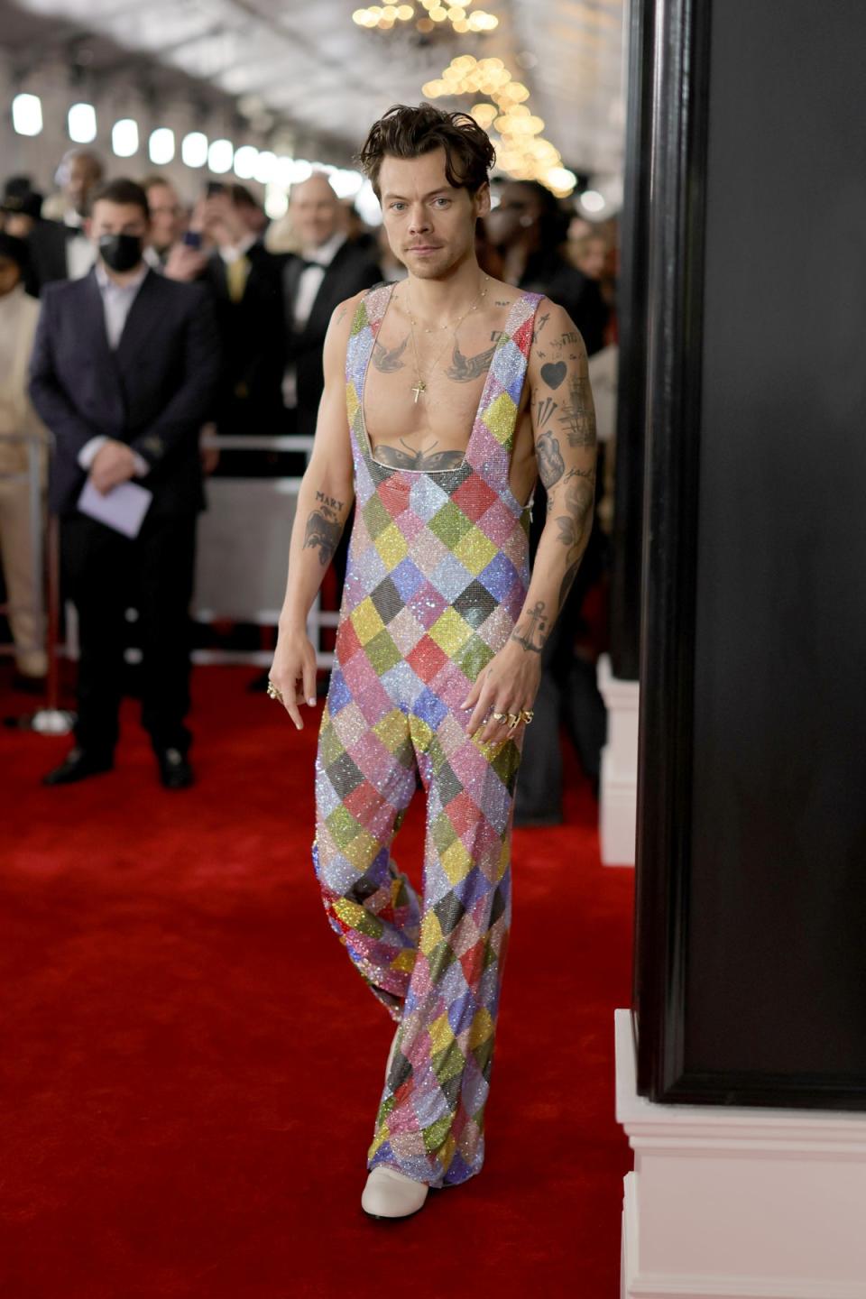 Harry Styles rocked up in one of his internet-breaking jumpsuits from the As It Was music video (Getty Images for The Recording Academy)