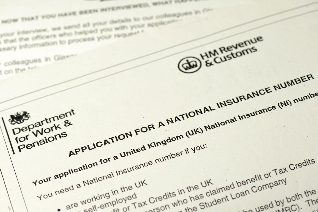 Application for a national insurance number form document by the Department for Work and Pensions in UK issued in 2014