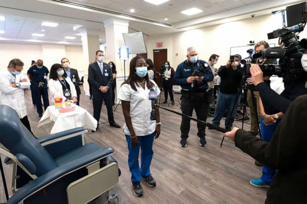 PHOTO: Nurse Sandra Lindsay, center, gives an interview after she is inoculated with the COVID-19 vaccine, Dec. 14, 2020 at the  Jewish Medical Center, in Queens, New York. (Pool via Getty Images)