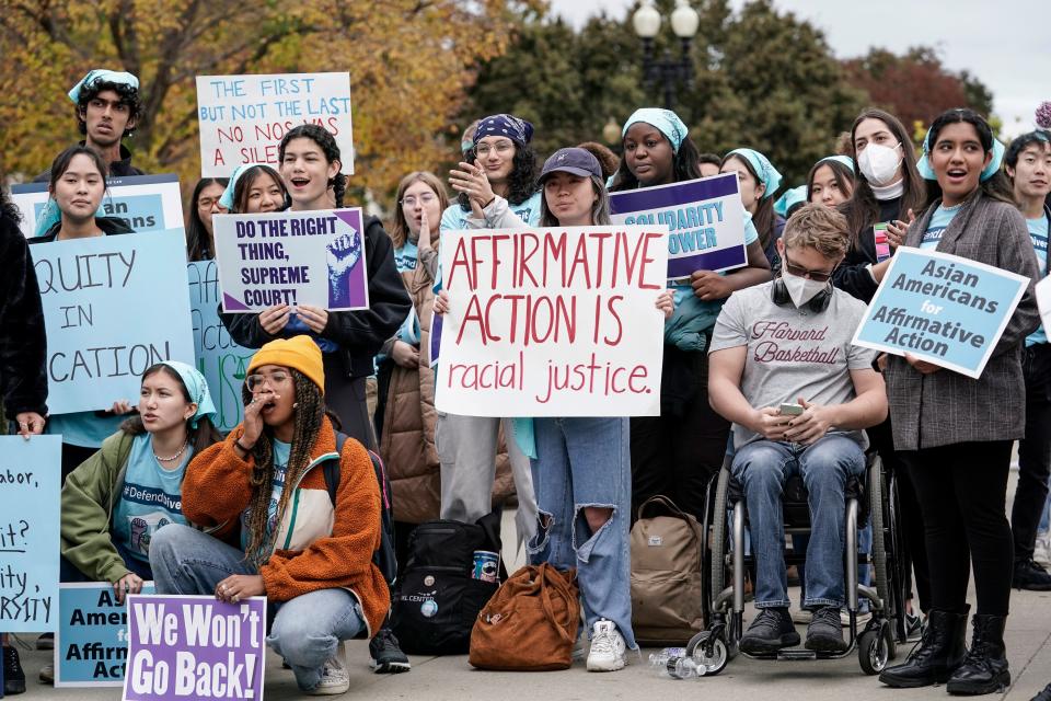 Activists demonstrate in October 2022 as the Supreme Court hears oral arguments on a pair of cases that could decide the future of affirmative action in college admissions.