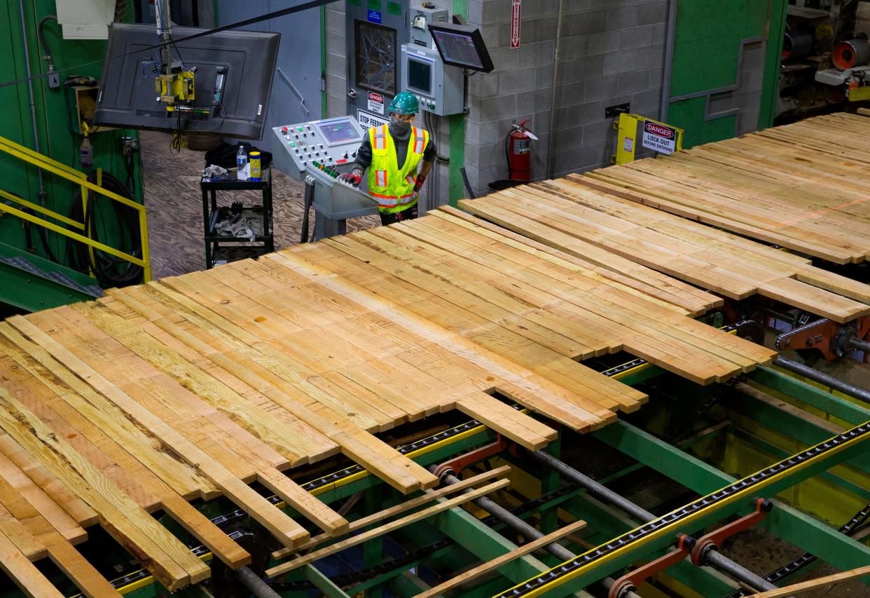 Freshly cut lumber heads through a sorting station in April at the Eugene sawmill formerly owned by Seneca Sawmill Co. California-based Sierra Pacific Industries bought the Eugene-based Seneca companies and plans "to continue investing in these mills and providing jobs at these mills."