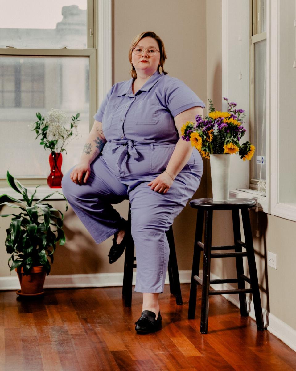 Margaret Baughman sits at home for a portrait.