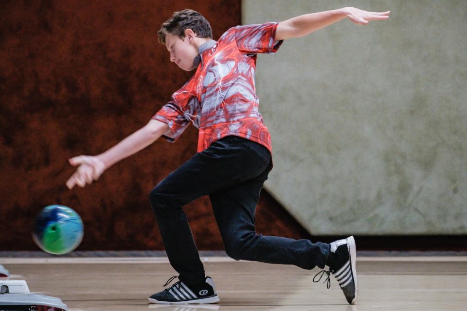 A bowler from Dover High School warms up during the Tuscarawas County Classic Saturday.