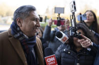 The Bolivian Foreign Minister, Rogelio Mayta, answers questions outside the World Court in The Hague, Netherlands, Thursday, Dec. 1, 2022, where the UN's top court rules on a dispute about a river that crosses Chile's and Bolivia's border, in a case seen as important jurisprudence at a time when fresh water is becoming an increasingly coveted world resource. (AP Photo/Peter Dejong)