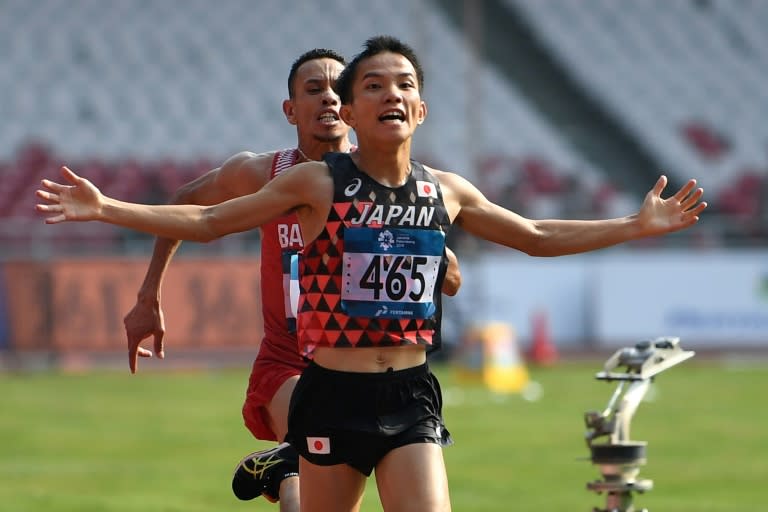 Japan's Hiroto Inoue won the marathon by a whisker