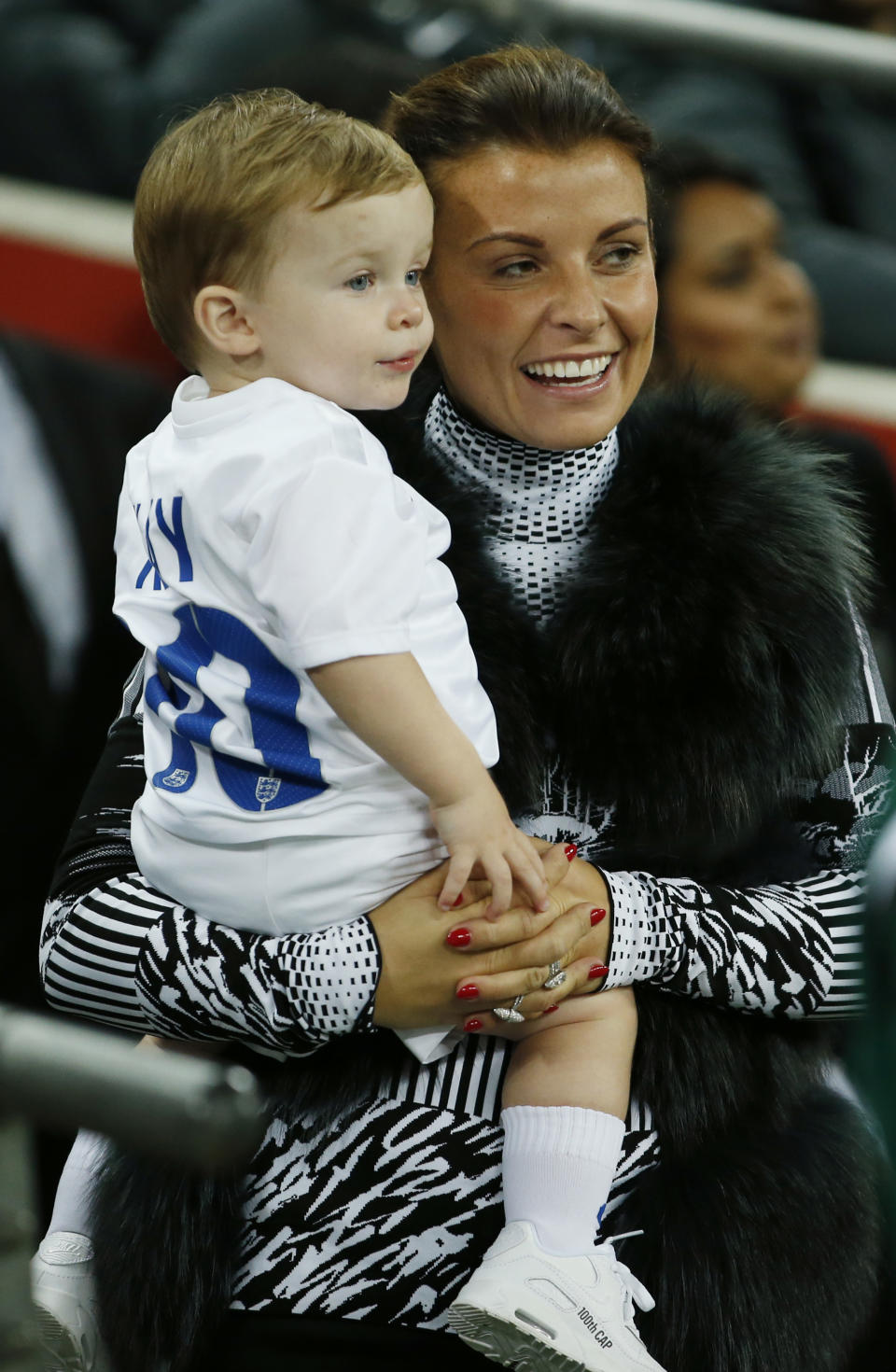 Football - England v Slovenia - UEFA Euro 2016 Qualifying Group E - Wembley Stadium, London, England - 15/11/14 
Wife of England's Wayne Rooney, Coleen Rooney watches on before the game with son Klay 
Mandatory Credit: Action Images / John Sibley 
Livepic 
EDITORIAL USE ONLY.