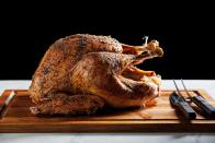 <p>In order to get that ideal turkey texture contrast-crispy skin on the outside, soft and juicy on the inside-you'll want to get it into a hot oven (450 degrees) for the first 30 minutes, then turn it down to 350 degrees to finish it off.</p>