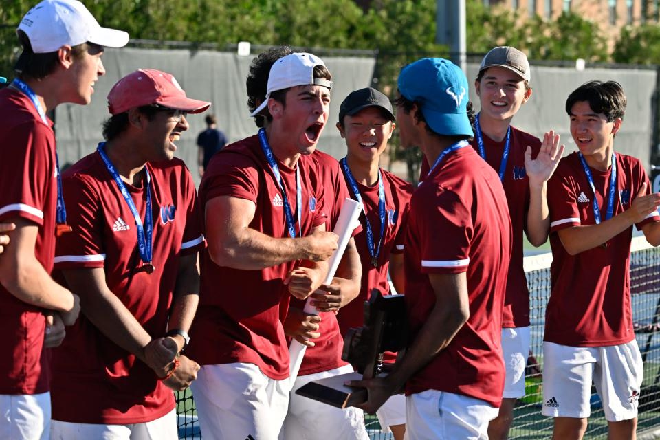 Brendan Estaphan of Westborough, center, cheers with his teammate at the conclusion of the Division 2 state tennis championship game versus Duxbury at MIT, Saturday, June 15, 2024.