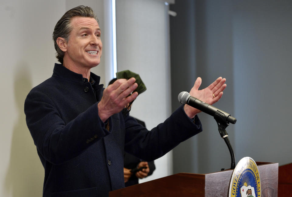 California Gov. Gavin Newsom speaks during a press conference at a COVID-19 vaccination site at AltaMed in Santa Ana, Calif., on Thursday, March 25, 2020. California is expanding its vaccine eligibility to anyone 50 and over starting in April and anyone 16 and over on April 15, Gov. Newsom said Thursday. (Jeff Gritchen/The Orange County Register via AP)