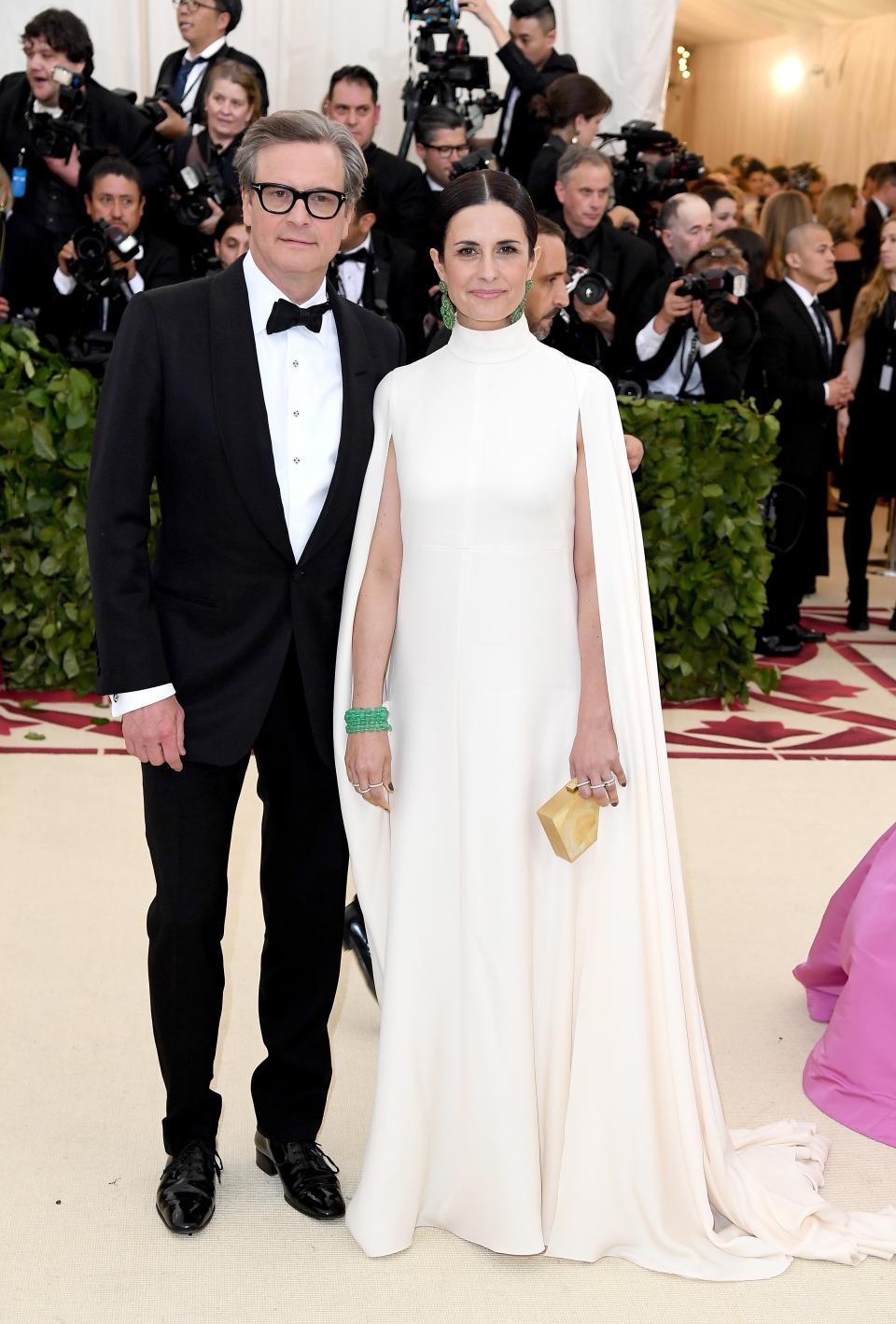 <h1 class="title">Colin Firth and Livia Firth in Giambattista Valli and Chopard jewelry</h1><cite class="credit">Photo: Getty Images</cite>