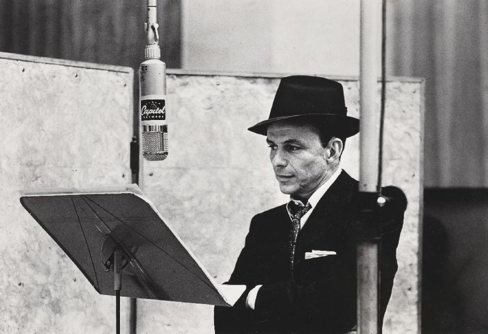 This handout photo provided by the National Portrait Gallery, taken in 1956, shows Frank Sinatra, by Herman Leonard. Curators at the National Portrait Gallery want to know what it means to be cool. They have been studying the uniquely American concept of “cool” and how it became a global export, and the museum now is bringing together 100 photographs of people who helped create the idea of “cool” as a name for rebellion, self-expression, charisma, edge and mystery. It includes musicians, actors, singers, athletes, comedians, activists and writers as photographed by Richard Avedon, Annie Leibovitz and others. (AP Photo/Herman Leonard, National Portrait Gallery)